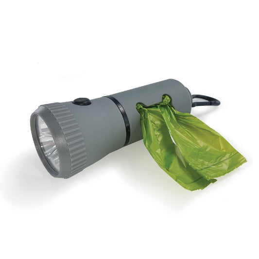 Gray flashlight with green dog poop bag attachment on a white background, featuring 'made from responsible materials' and 'epl' logos.